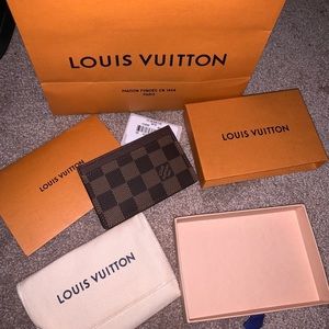 Louis Vuitton authentic card holder never used